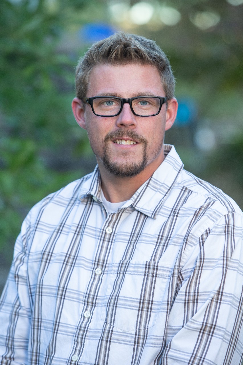 Headshot of Greg Schulman