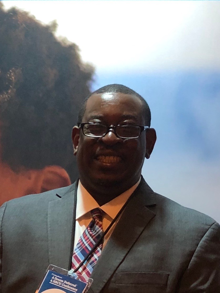 Headshot of Marvin Reid, Jr.