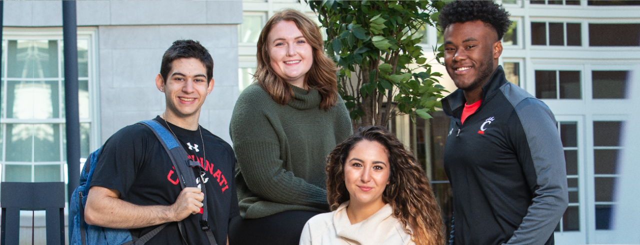 Three females and two males who are students within the School of Human Services.