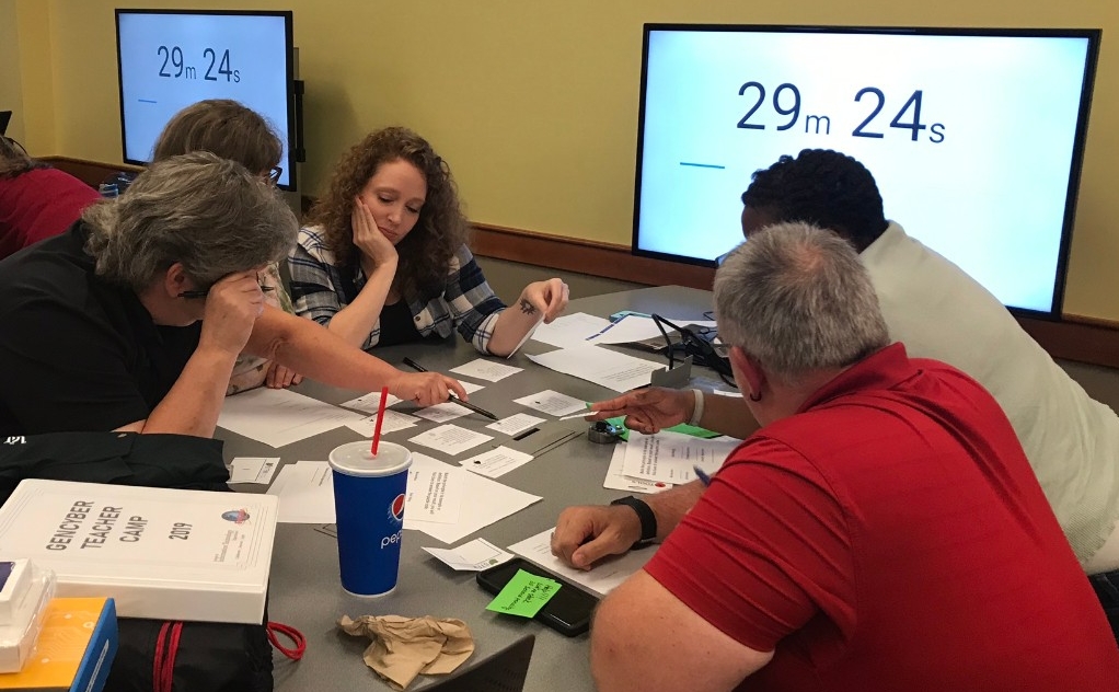 Team works through a group exercise during 2019 GenCyber Camp