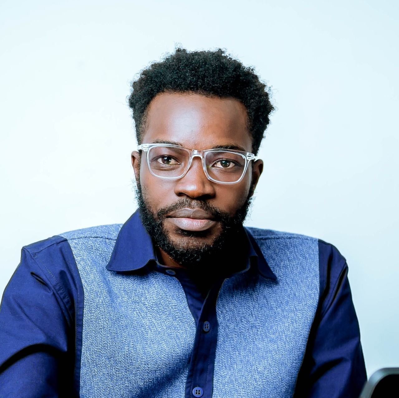 Headshot of Thomas Synaepa-Addison