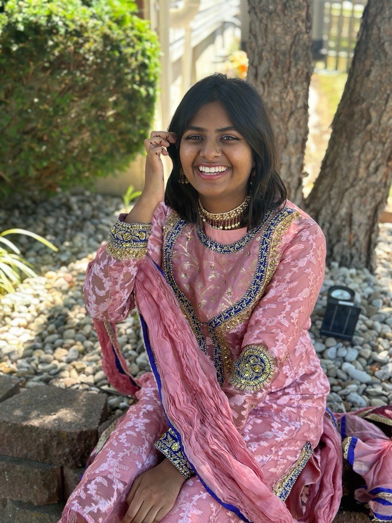 Headshot of Reja Khan